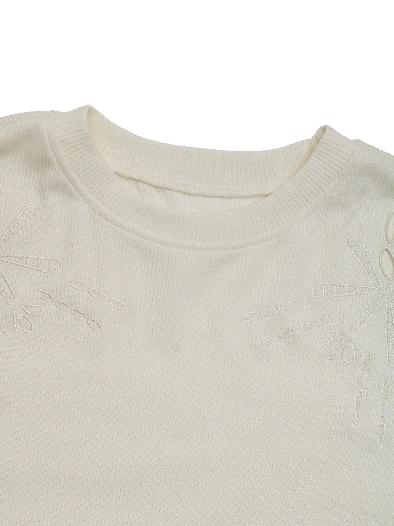 Textured embroidered patchwork top