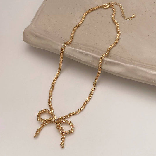 WEAR A HIGH-END METAL ROUND BEAD BOW NECKLACE