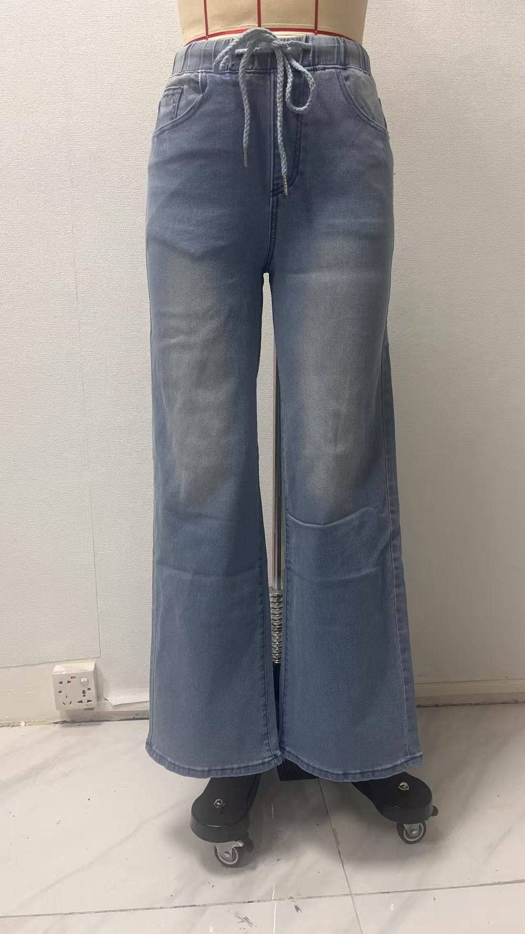 Lace-up waist-cinching straight-leg trousers