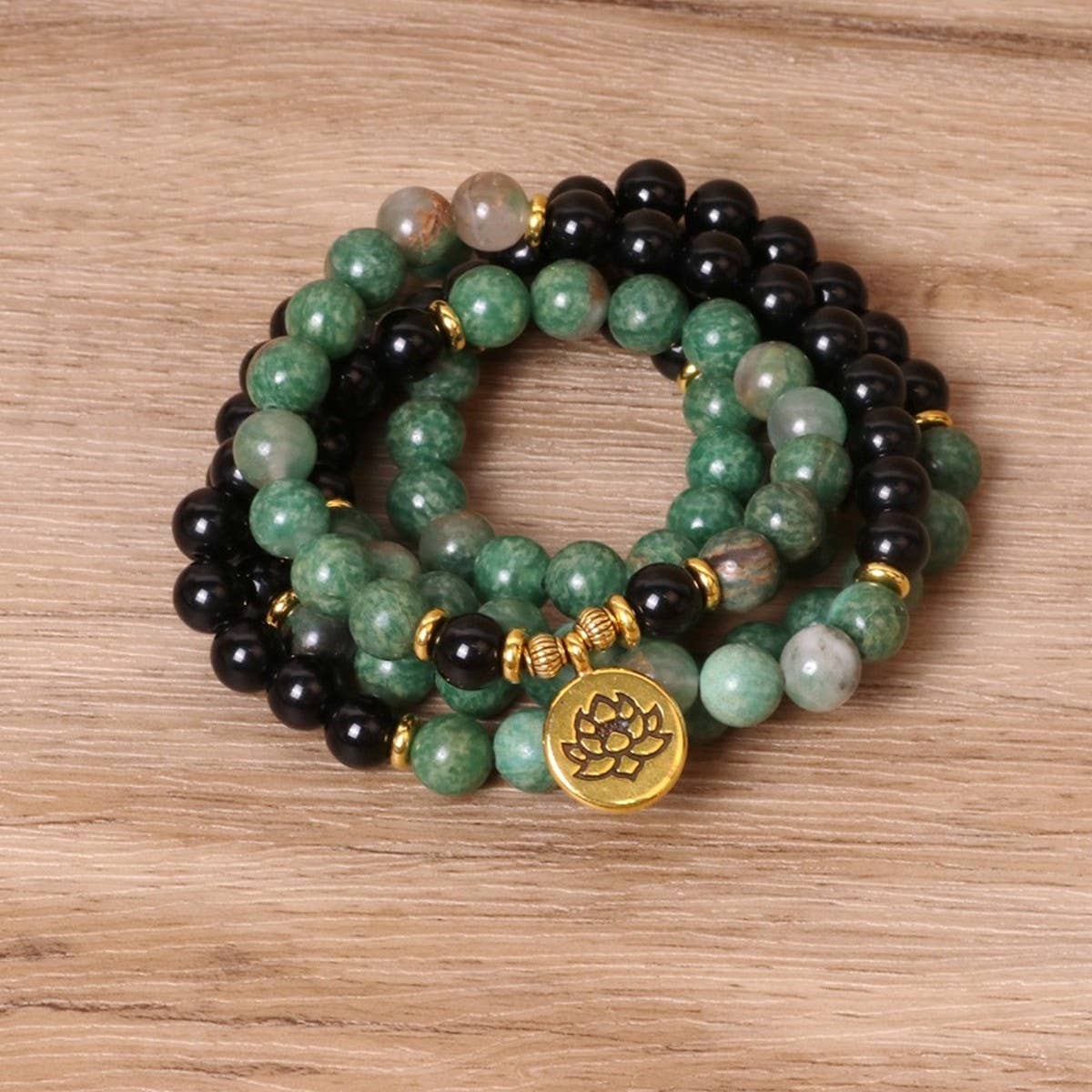 GREEN,BLACK BEADED BRACELETS WITH STRETCHY BANDS