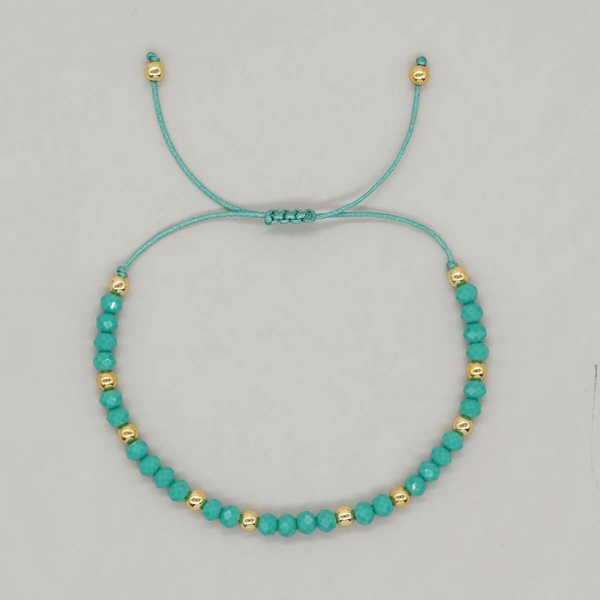 CRYSTAL GOLD BEADED HAND-WOVEN BRACELET