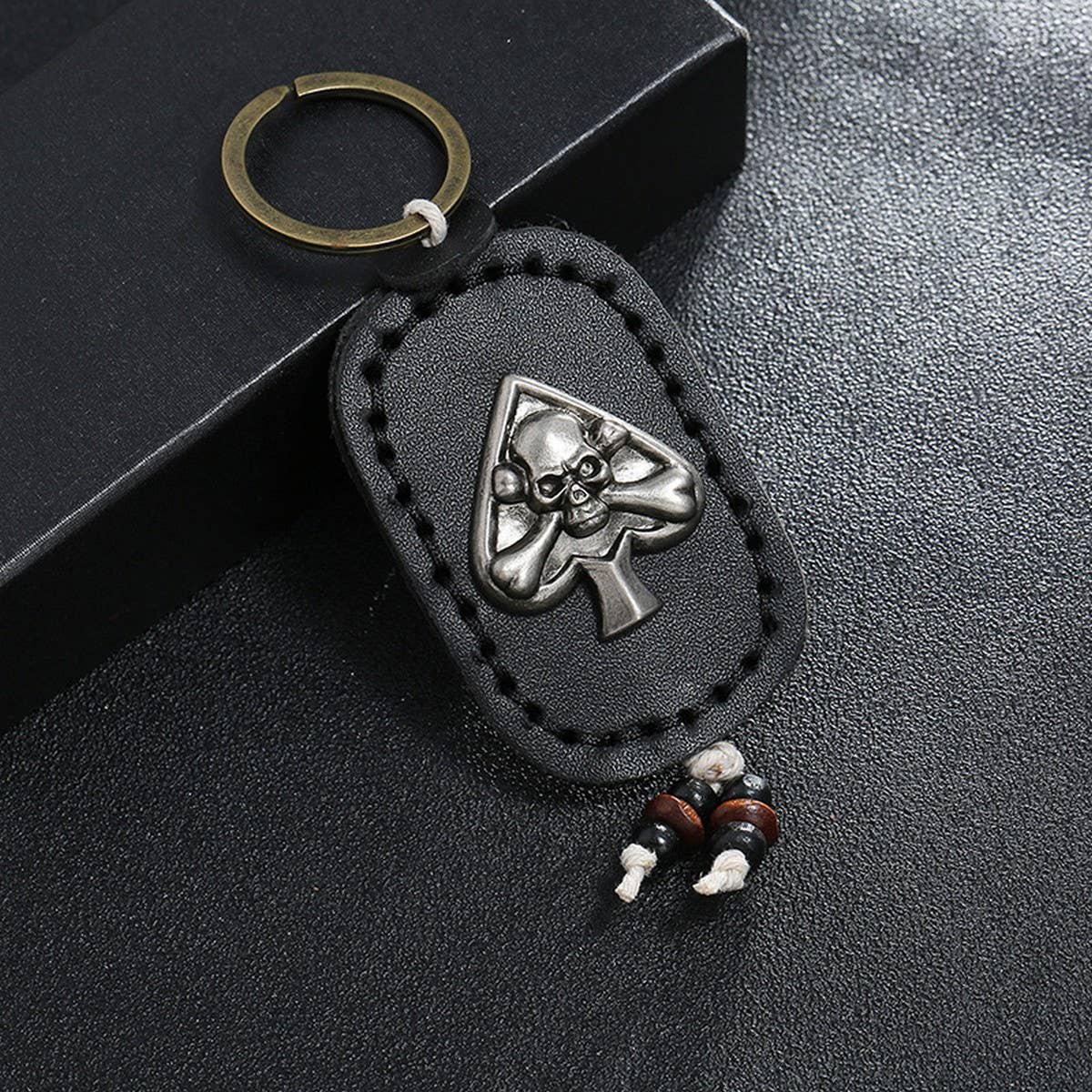 DOUBLE-SIDED SKULL VINTAGE LEATHER KEYCHAIN