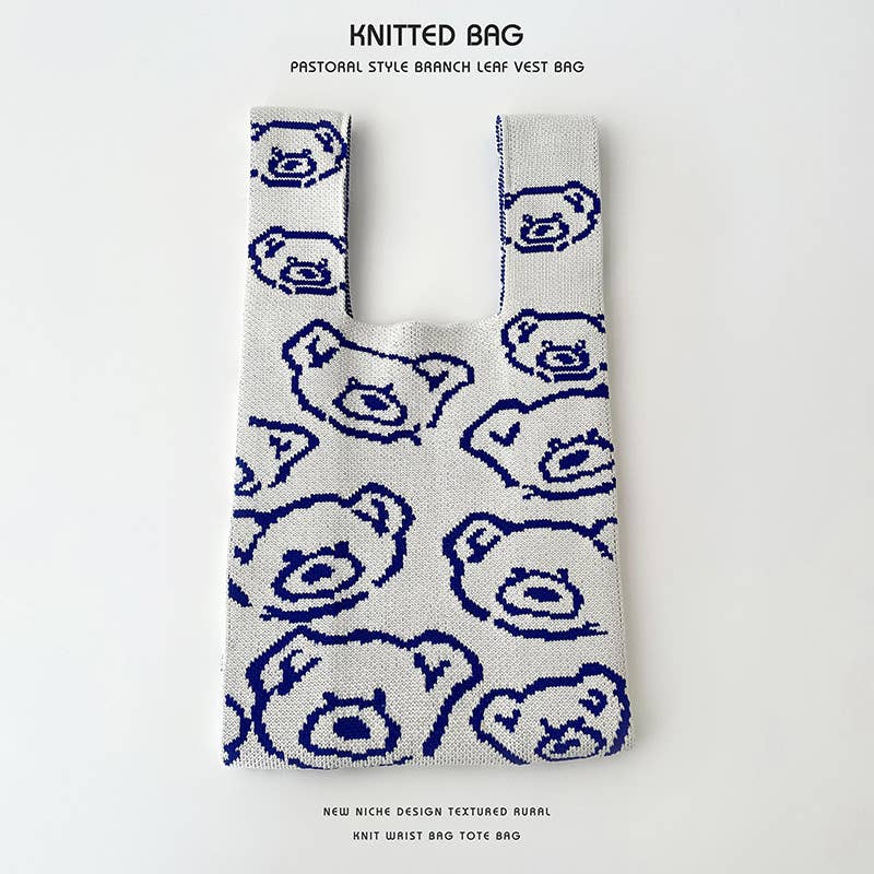 Heart-shaped color-blocked knitted handbag