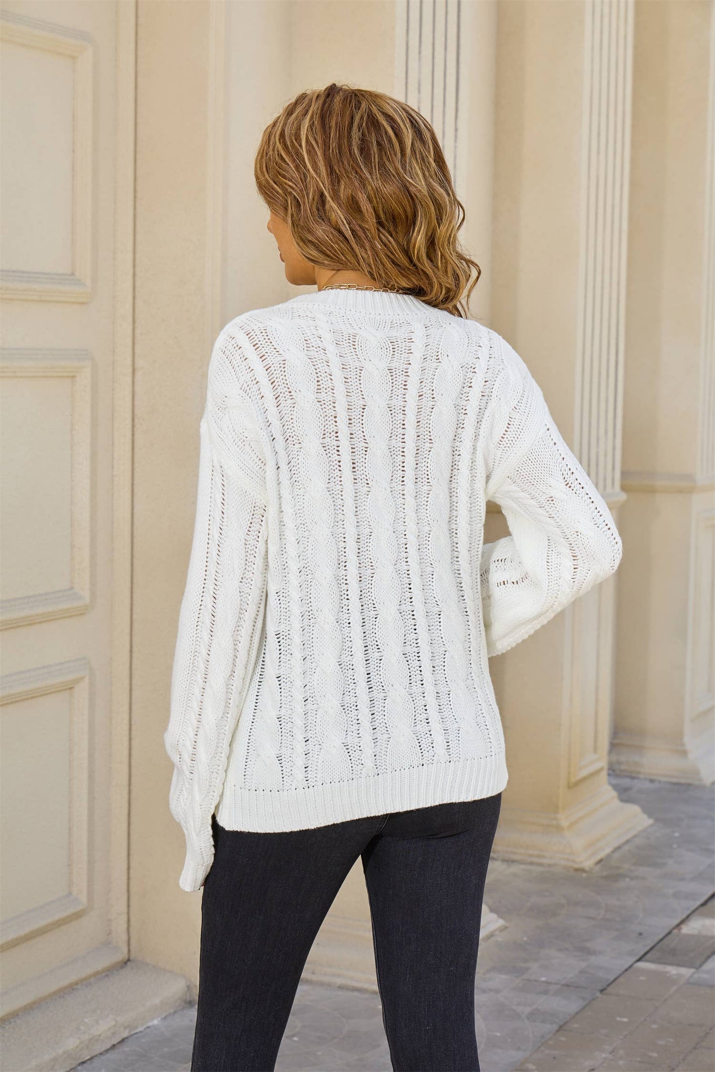 Solid-colored twisted round-neck loose sweater