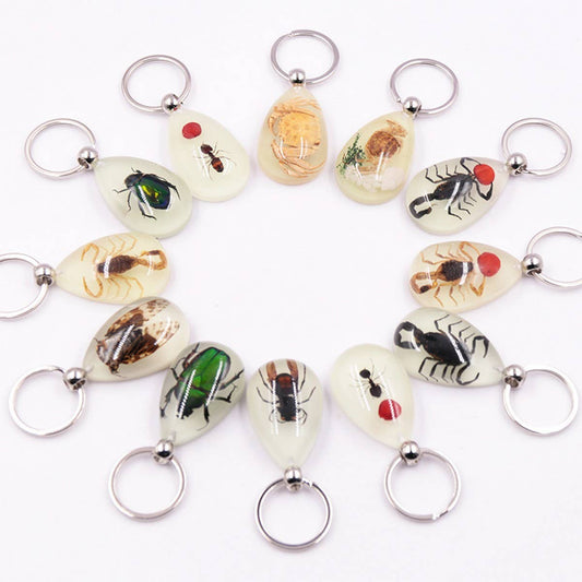 AMBER GLOW-IN-THE-DARK INSECT KEYCHAIN PENDANT_CWMM3698