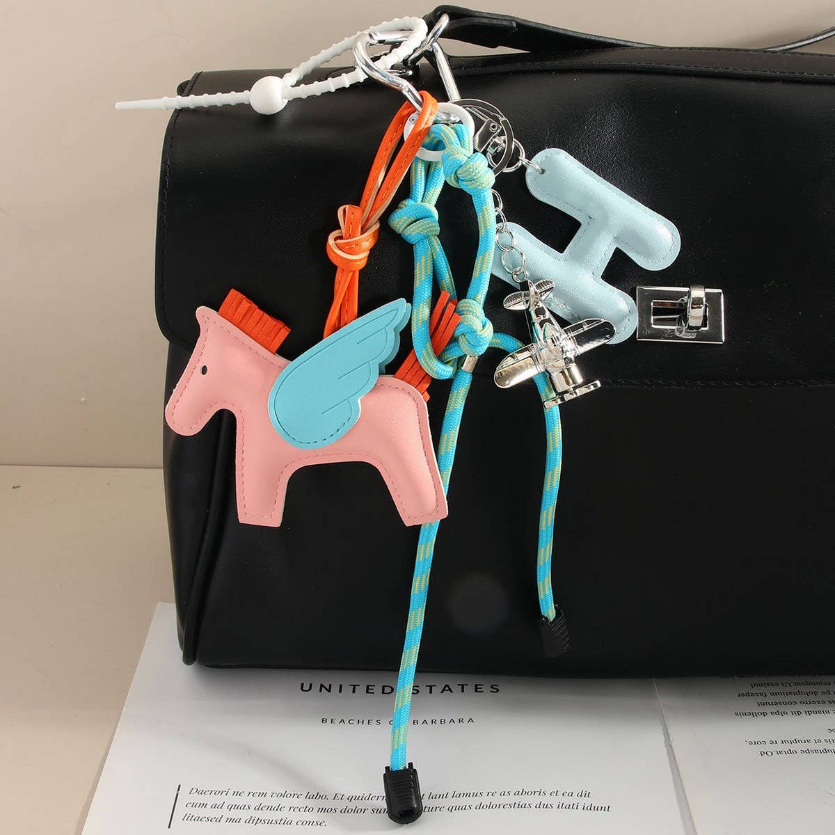 Leather Pegasus & Plane Letter Bag Charm_CWMM7566