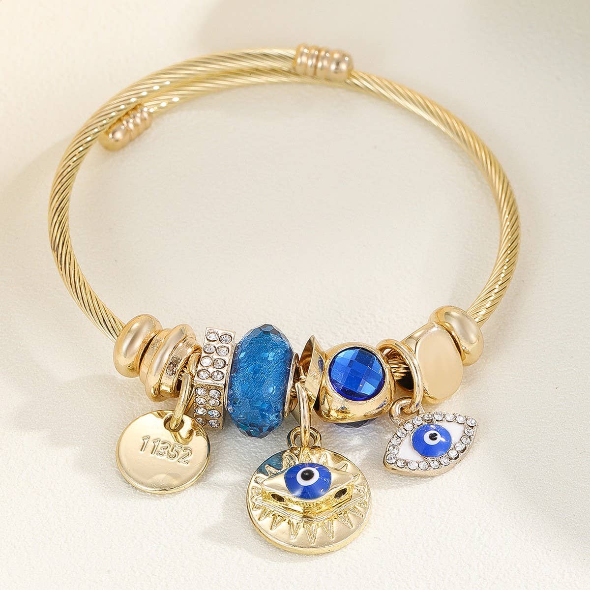 Trendy Gold Steel Bracelet with Enamel Charm