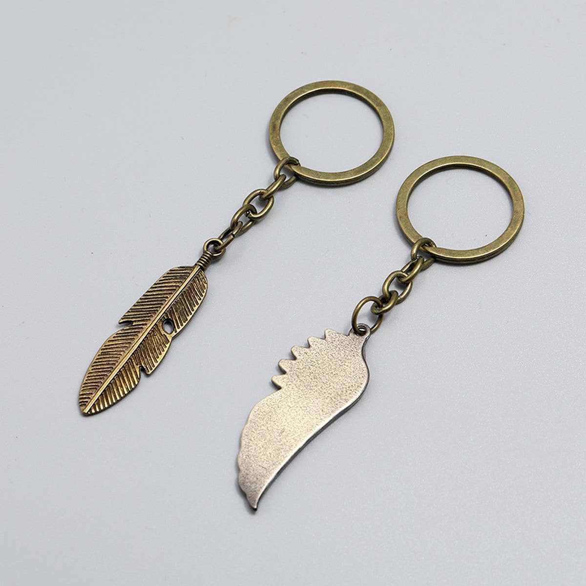 CREATIVE BRONZE WINGS FEATHER KEYCHAIN