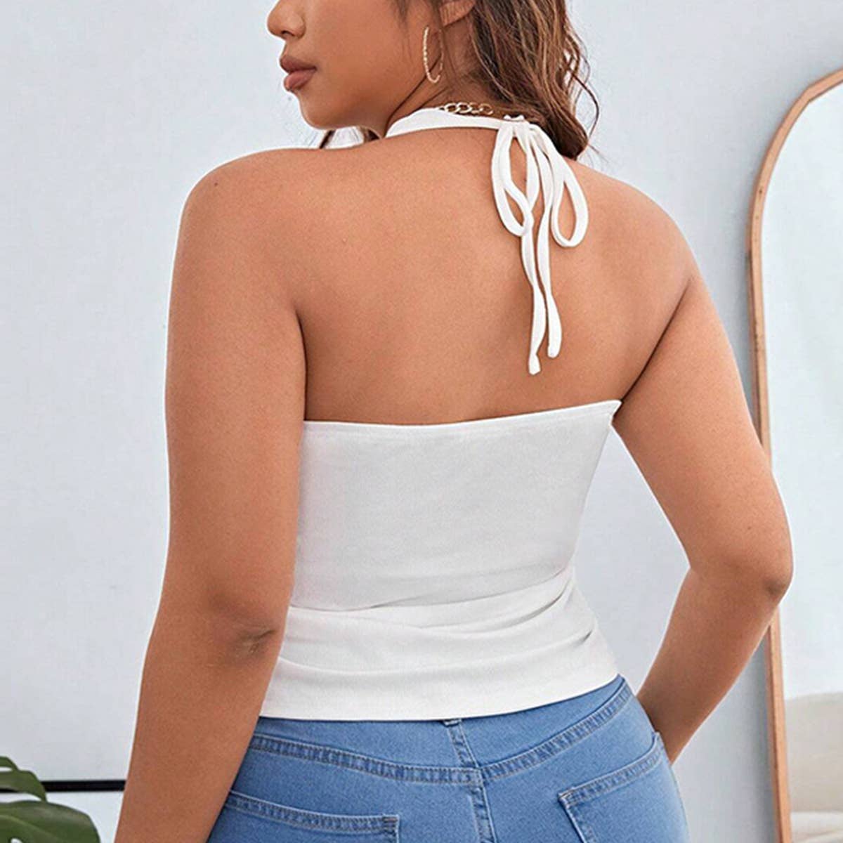 Slimming hemline halter tank top