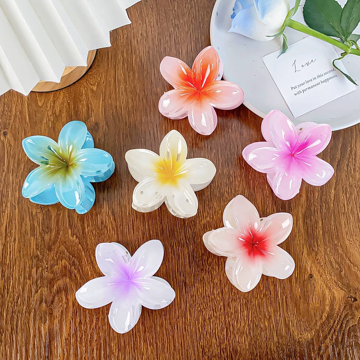 Frangipani hand-held vintage flower hair clips