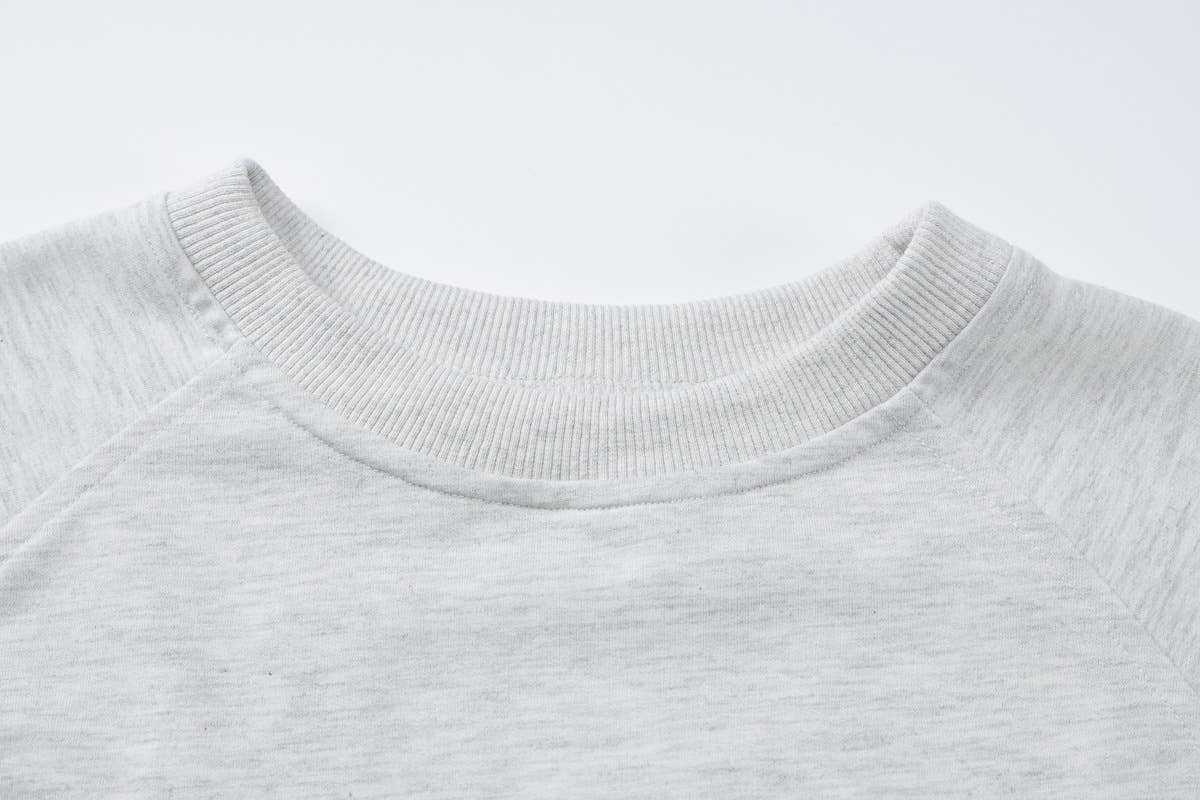 Long-sleeved sweatshirt and pleated skirt set