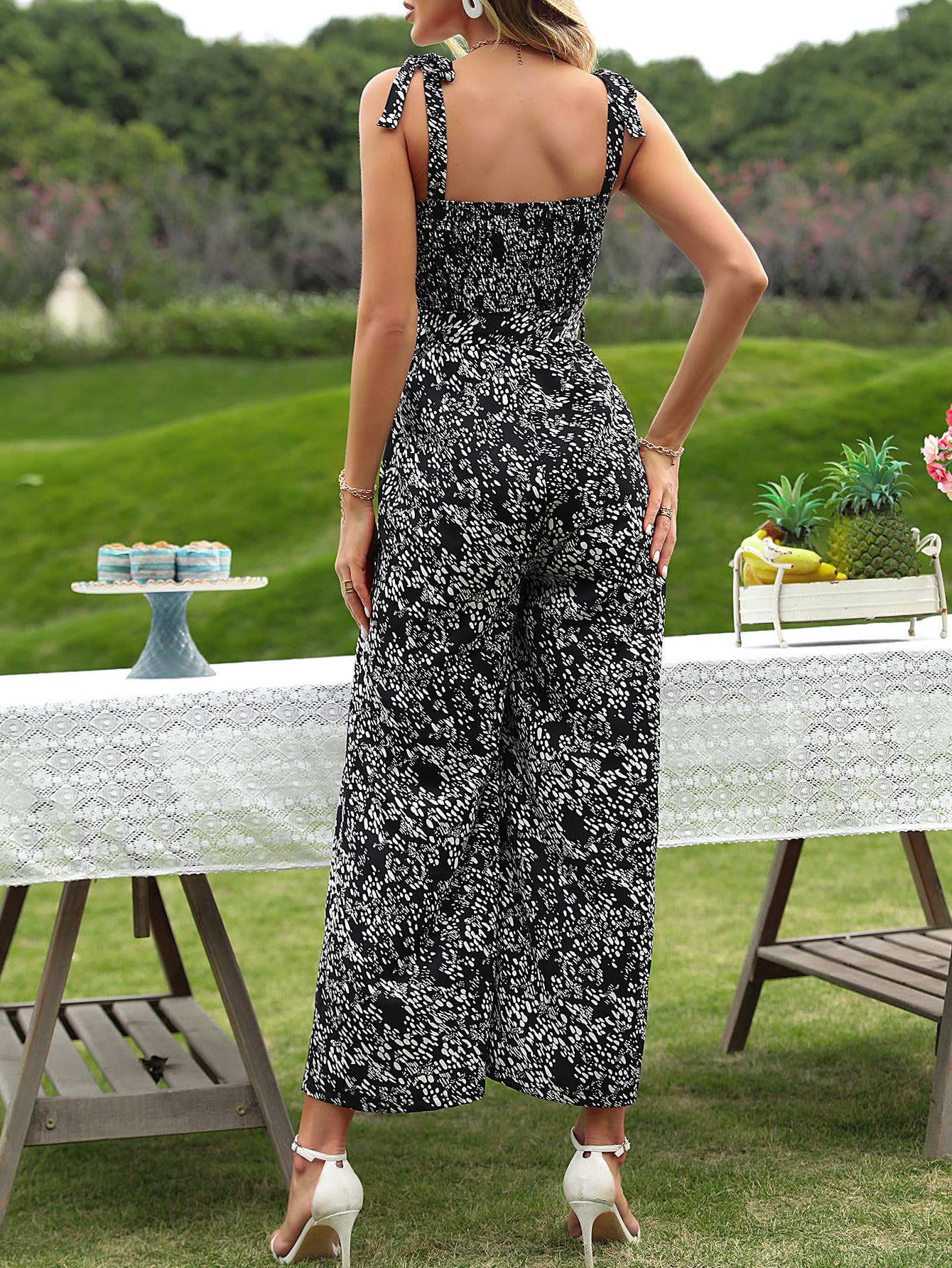 Waist-cinching, strappy one-piece wide-leg pants