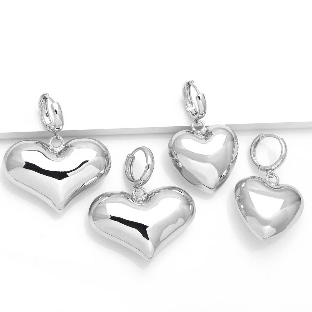 SILVER HEART-SHAPED PENDANT EARRINGS
