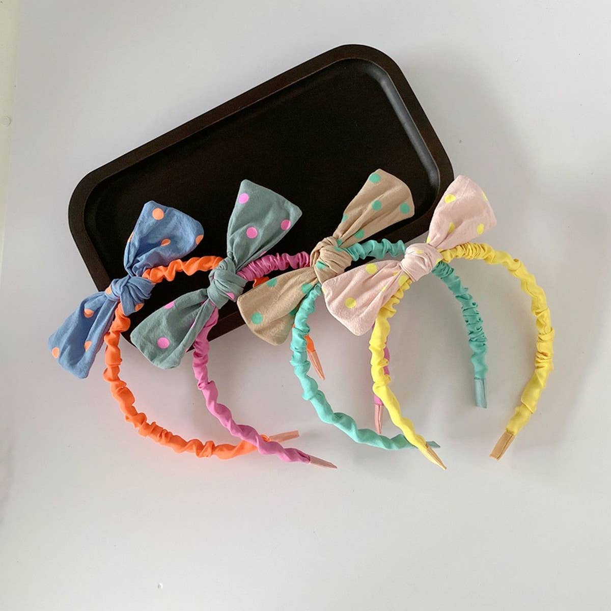 CHILDREN'S POLKA DOT BOW HEADBAND