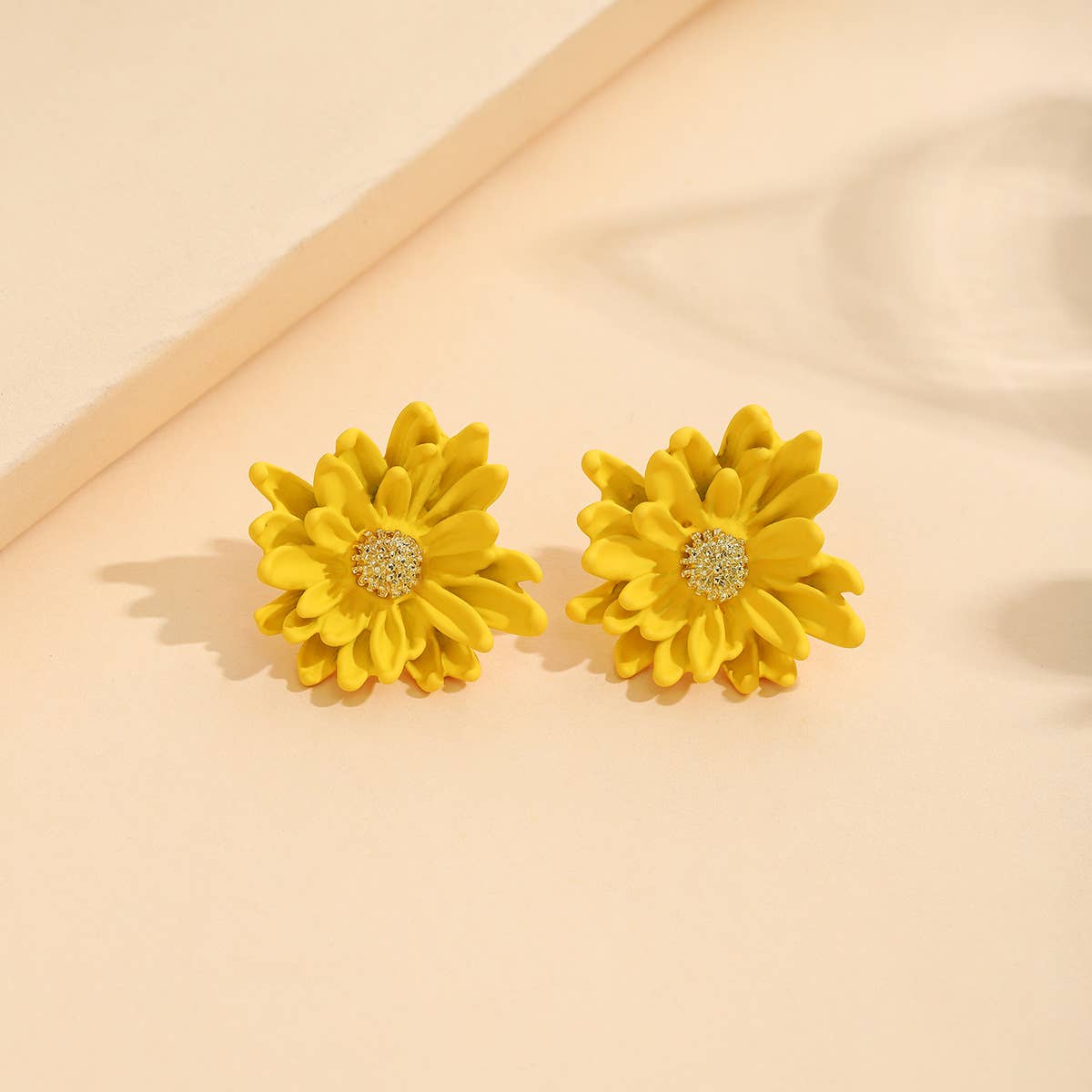 Spray-painted three-dimensional floral earrings
