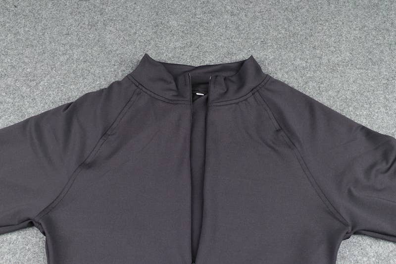 Solid-color round-neck semi-cardigan jumpsuit