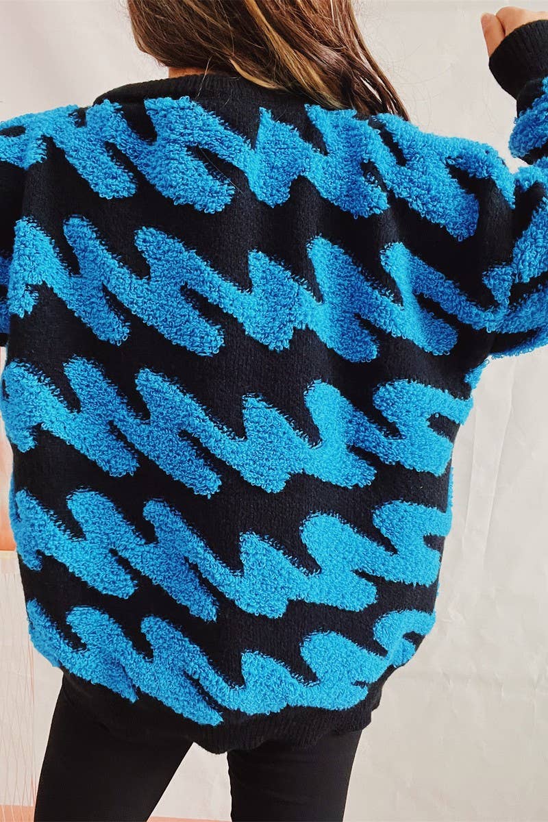 Long sleeve knit sweater with wavy stripes flocking