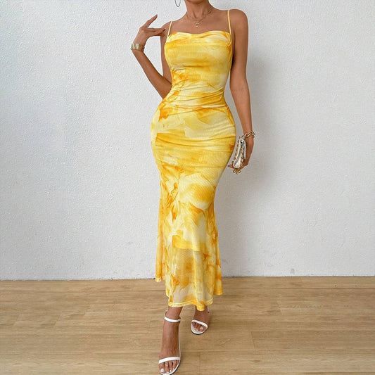 Printed high-waisted hip-hugging halter dress