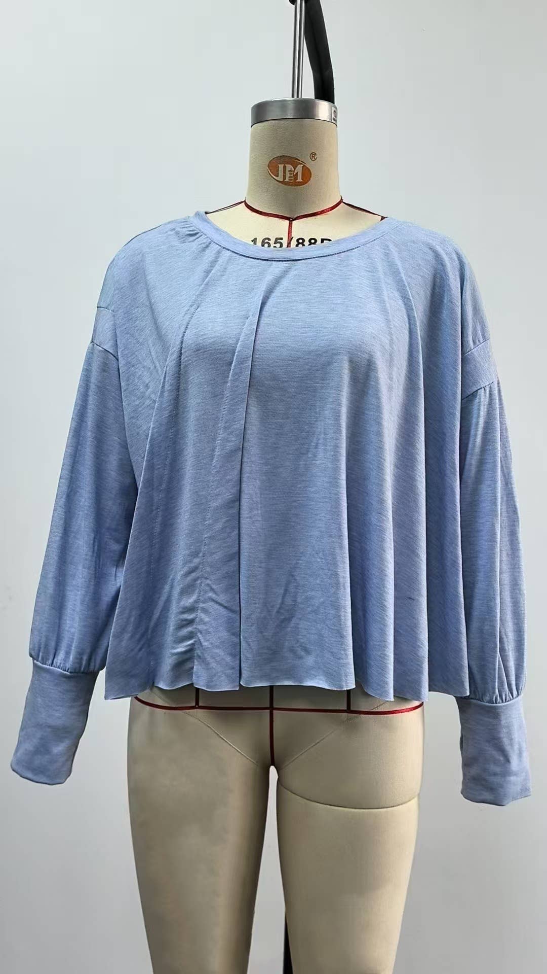 Long sleeve solid color loose back cut-out top
