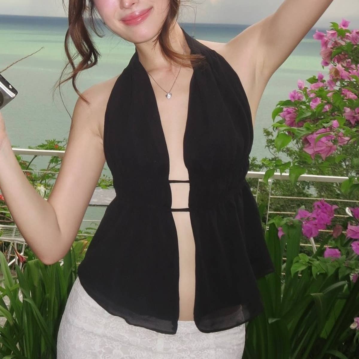 Solid-color backless, lace-up halter top