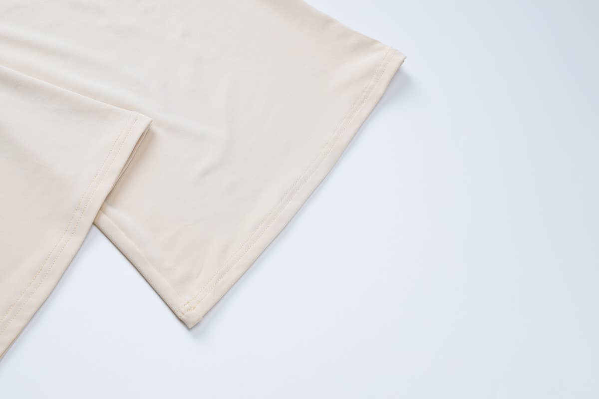 Long-sleeved top tight trousers and pleated suit