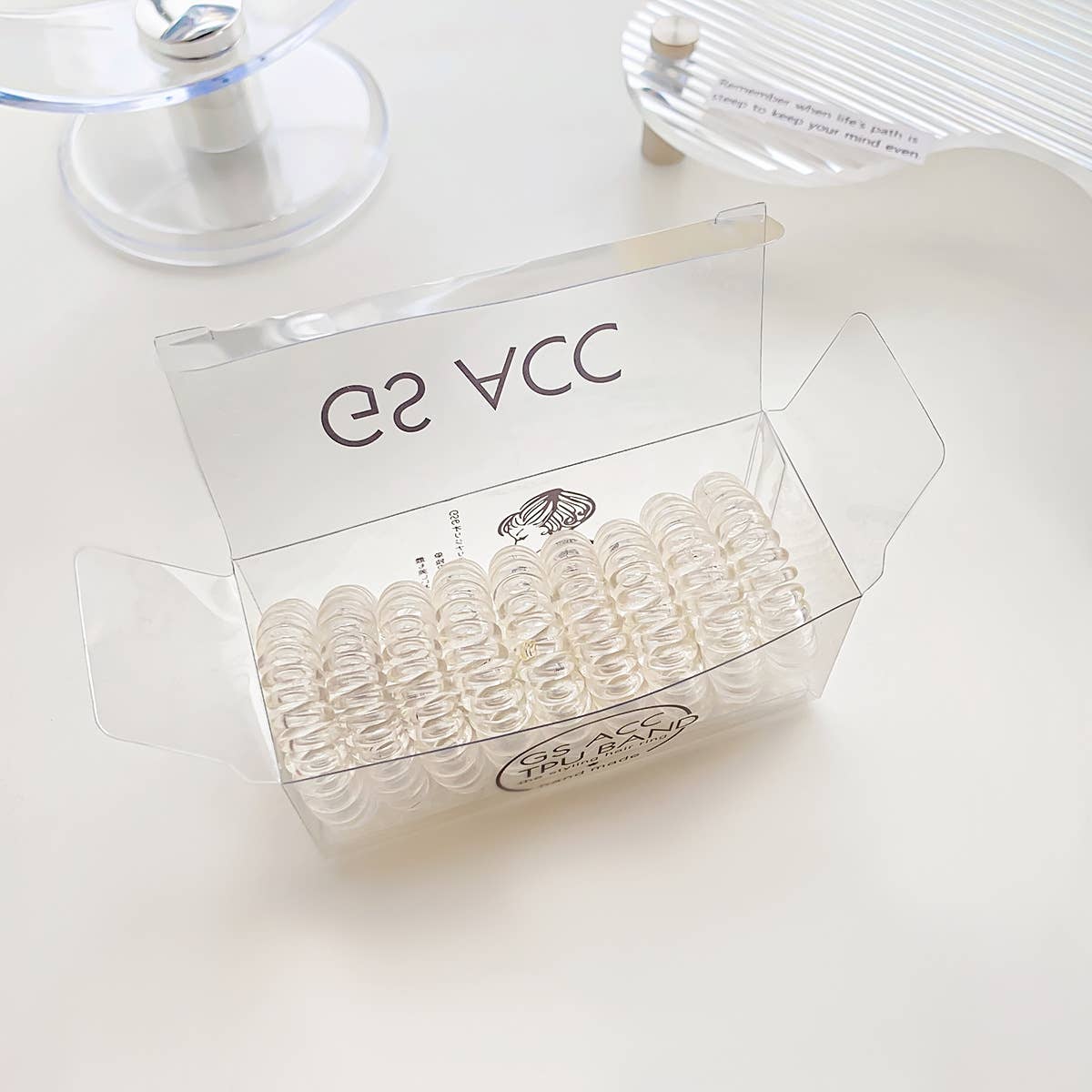 Nine candy-colored rubber bands for hair ties