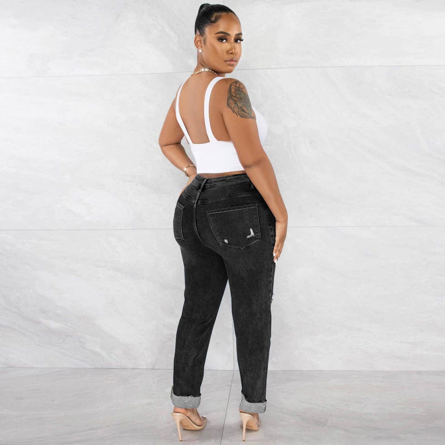 Slim fit ripped high-waisted skinny jeans