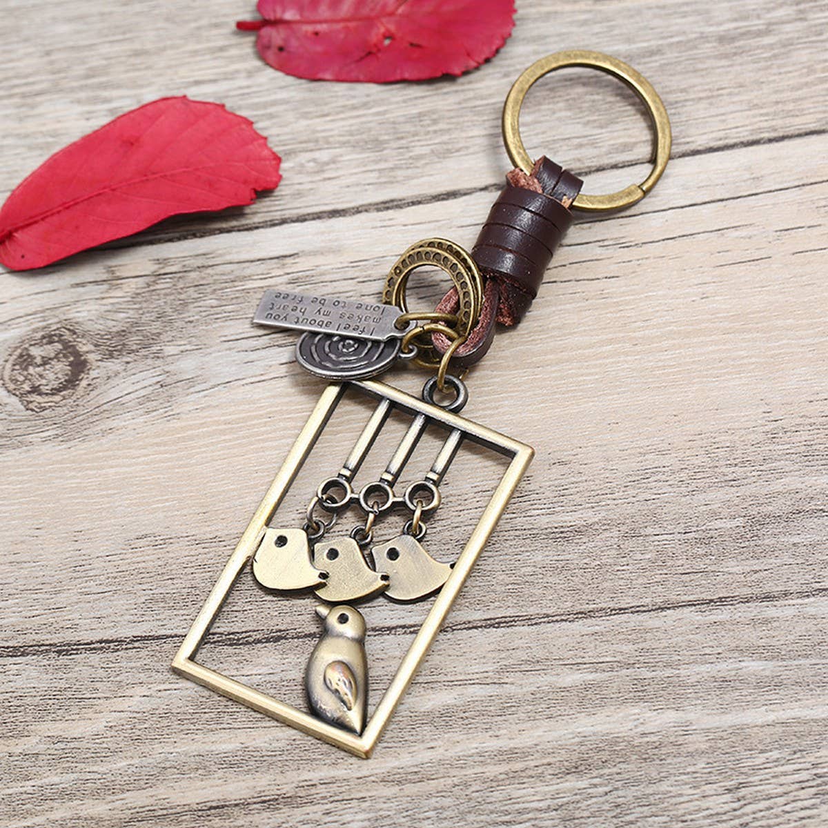 ALLOY BIRD PENDANT WOVEN LEATHER KEYCHAIN_CWMM5038