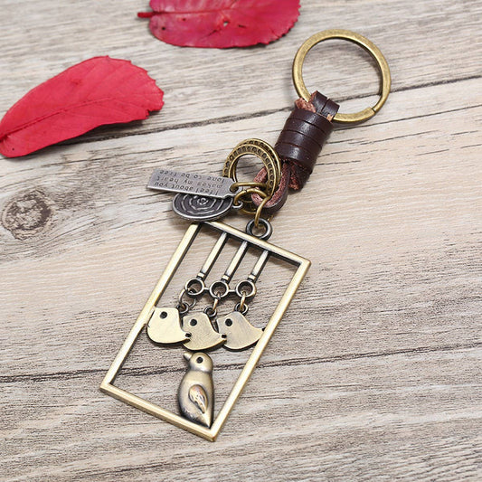 ALLOY BIRD PENDANT WOVEN LEATHER KEYCHAIN_CWMM5038