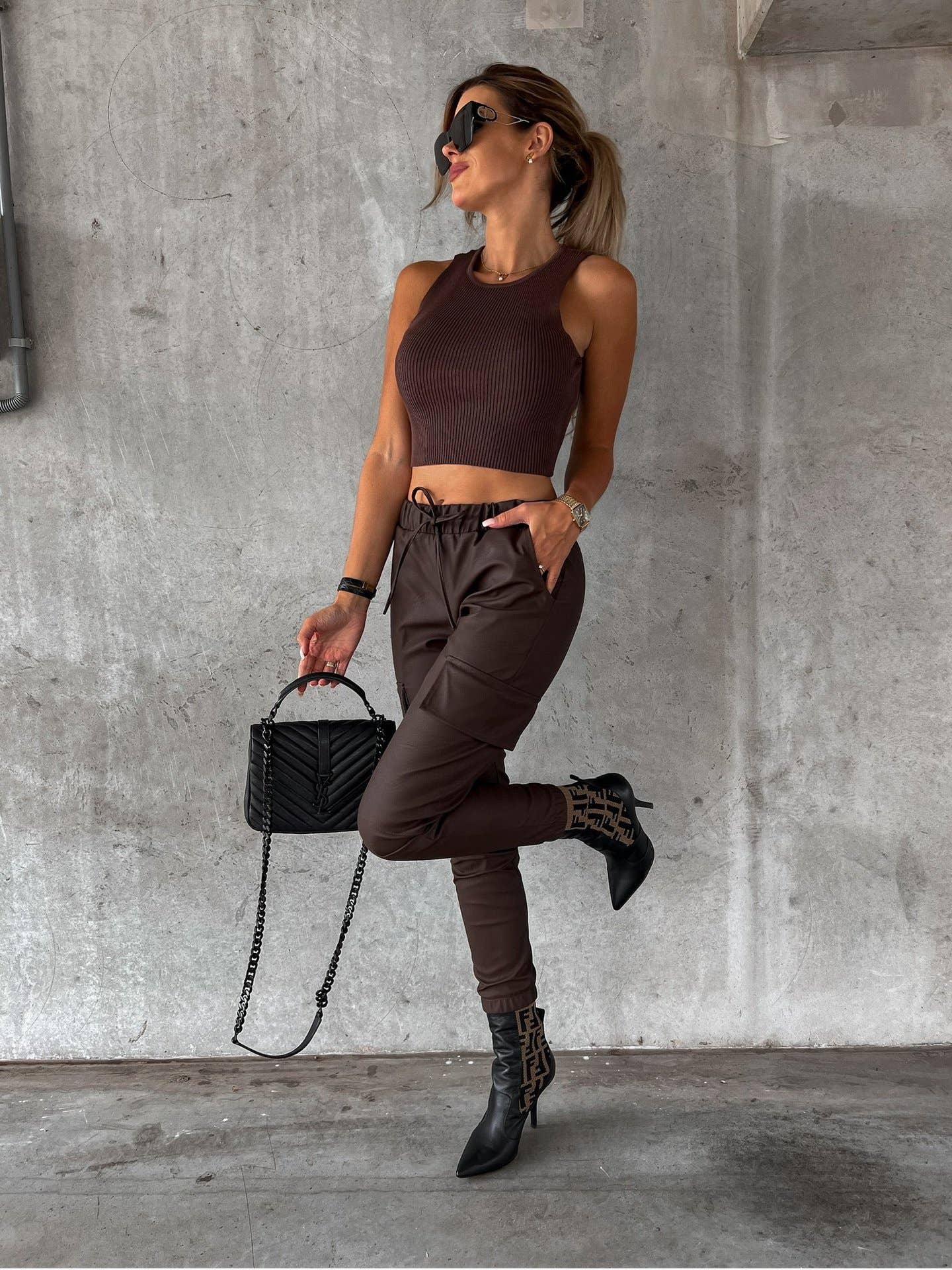 Waist-cinching street drawstring leather pants