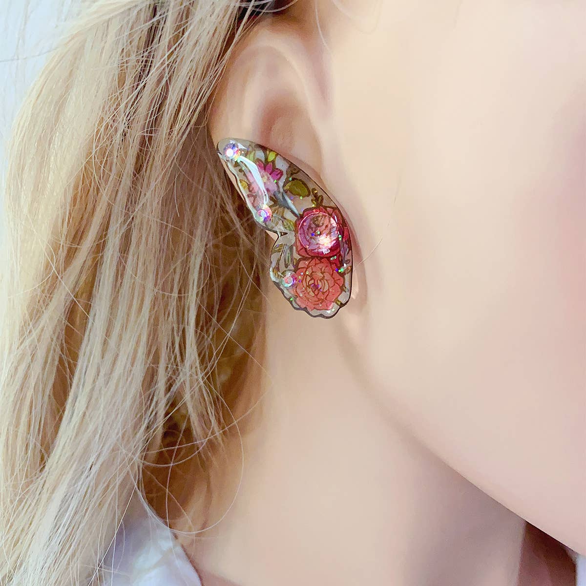 Painted ear studs with simulated butterfly wings
