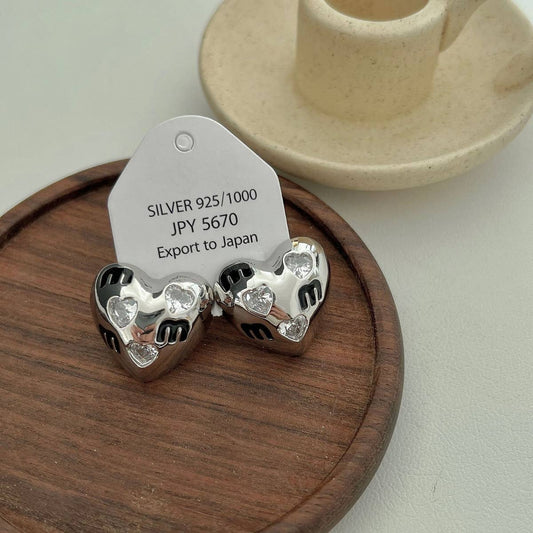 HALF FACE THREE-DIMENSIONAL EARRINGS