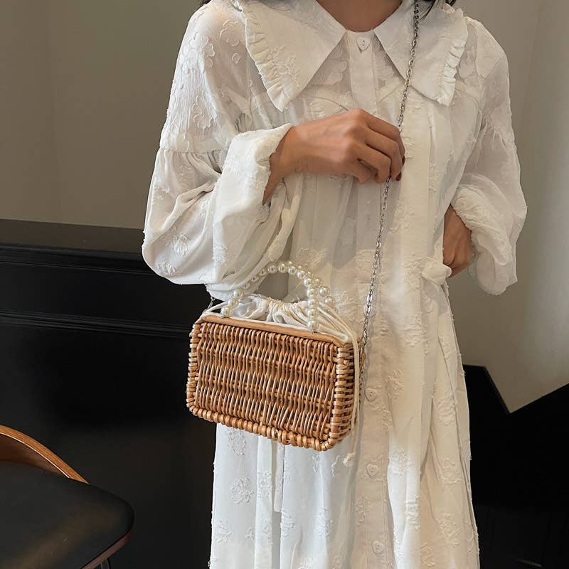 Fashionable perforated beach basket bag