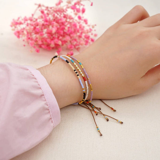 HAND-WOVEN MILLET BEADED STACKING BRACELET