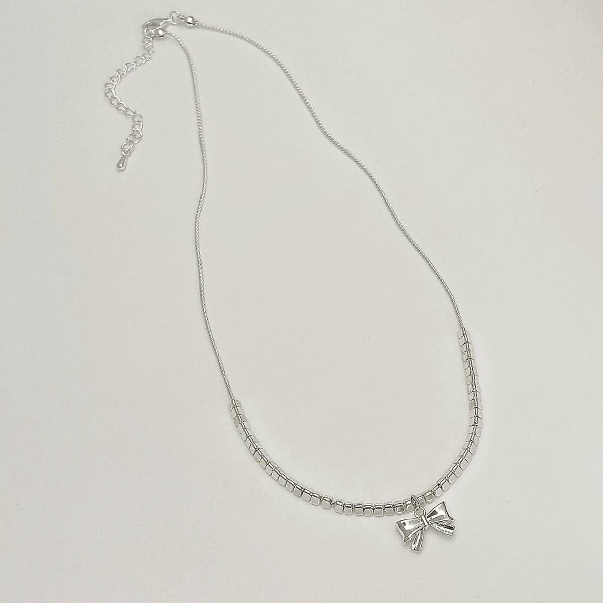 NEW HIGH-END VERSATILE BOW PENDANT NECKLACE