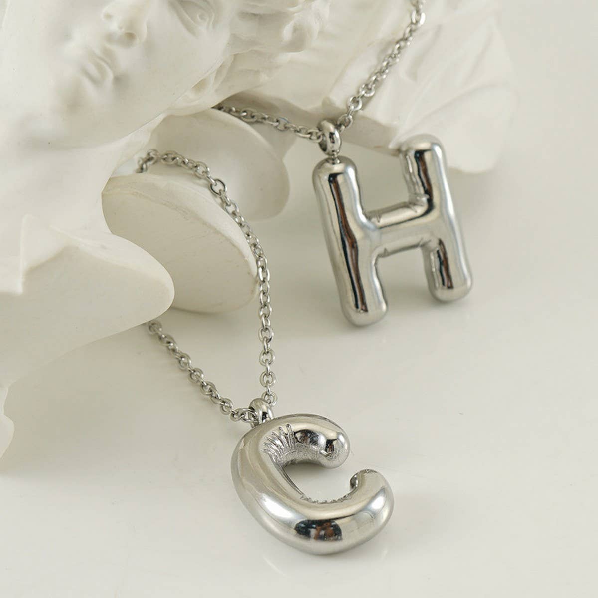CWAJE1946_Steel Color Bubble Letter Necklace