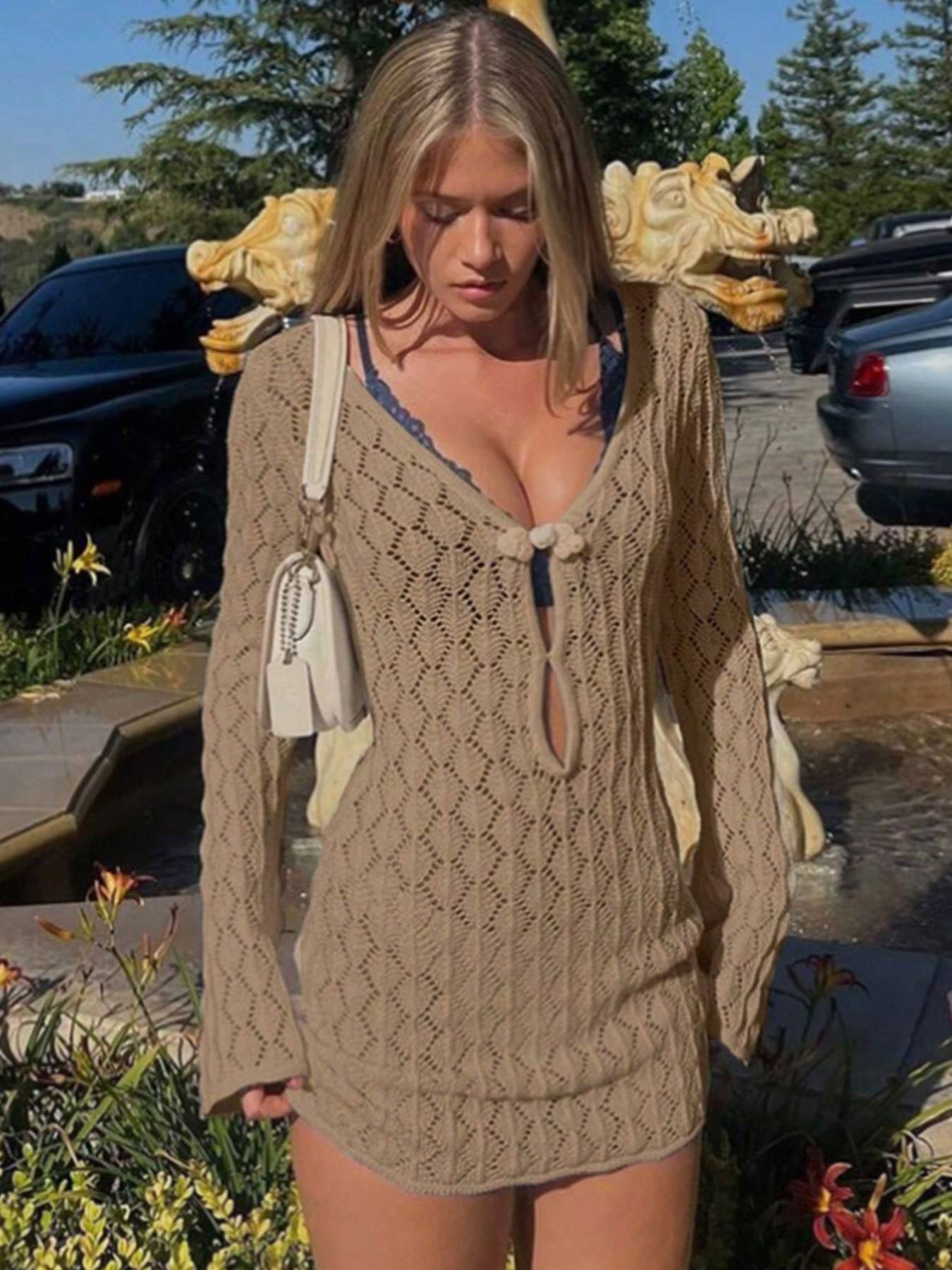 Hollowed-out hip-hugging knitted dress