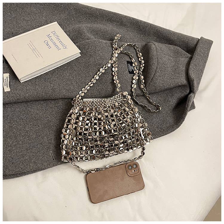 Fashionable hollowed-out glossy crossbody bag