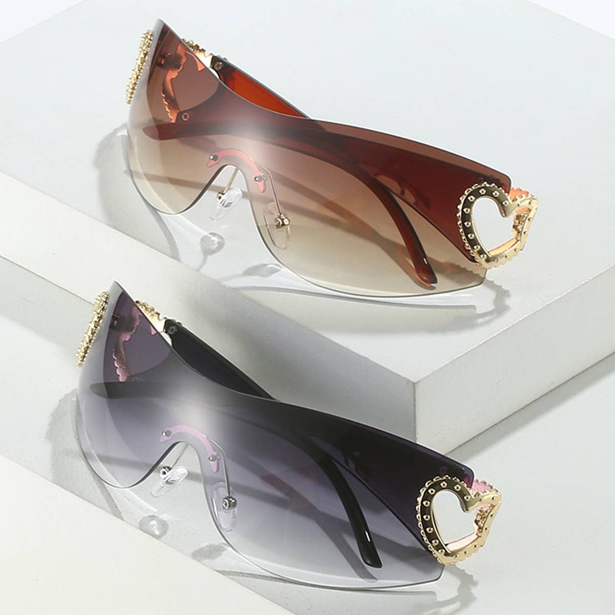 Y2K STYLE FRAMELESS ONE-PIECE HEART SUNGLASSES_CWASG0266