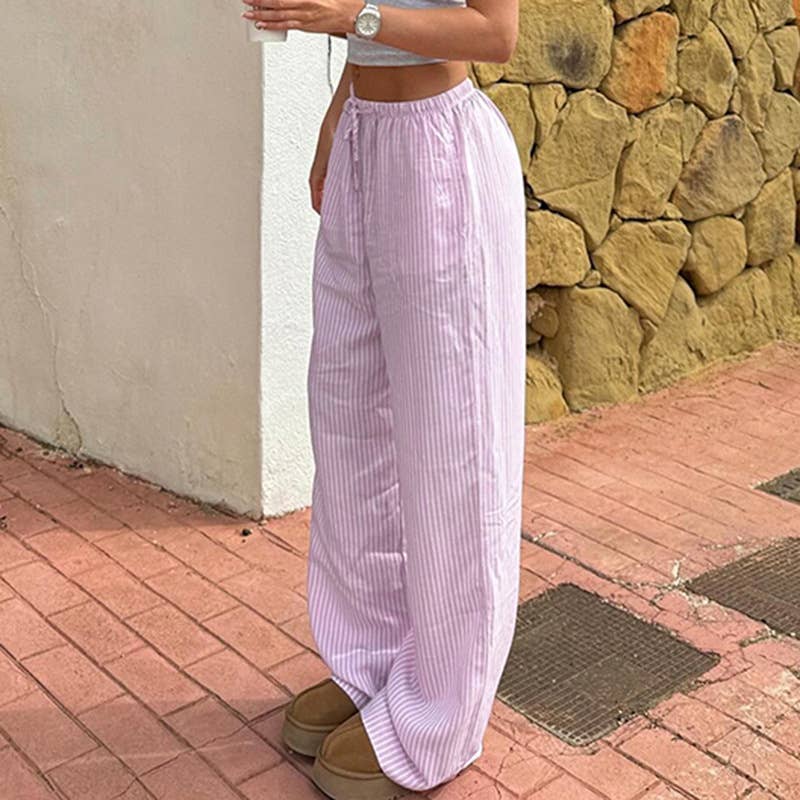 Low-waisted loose-fitting straight-leg trousers