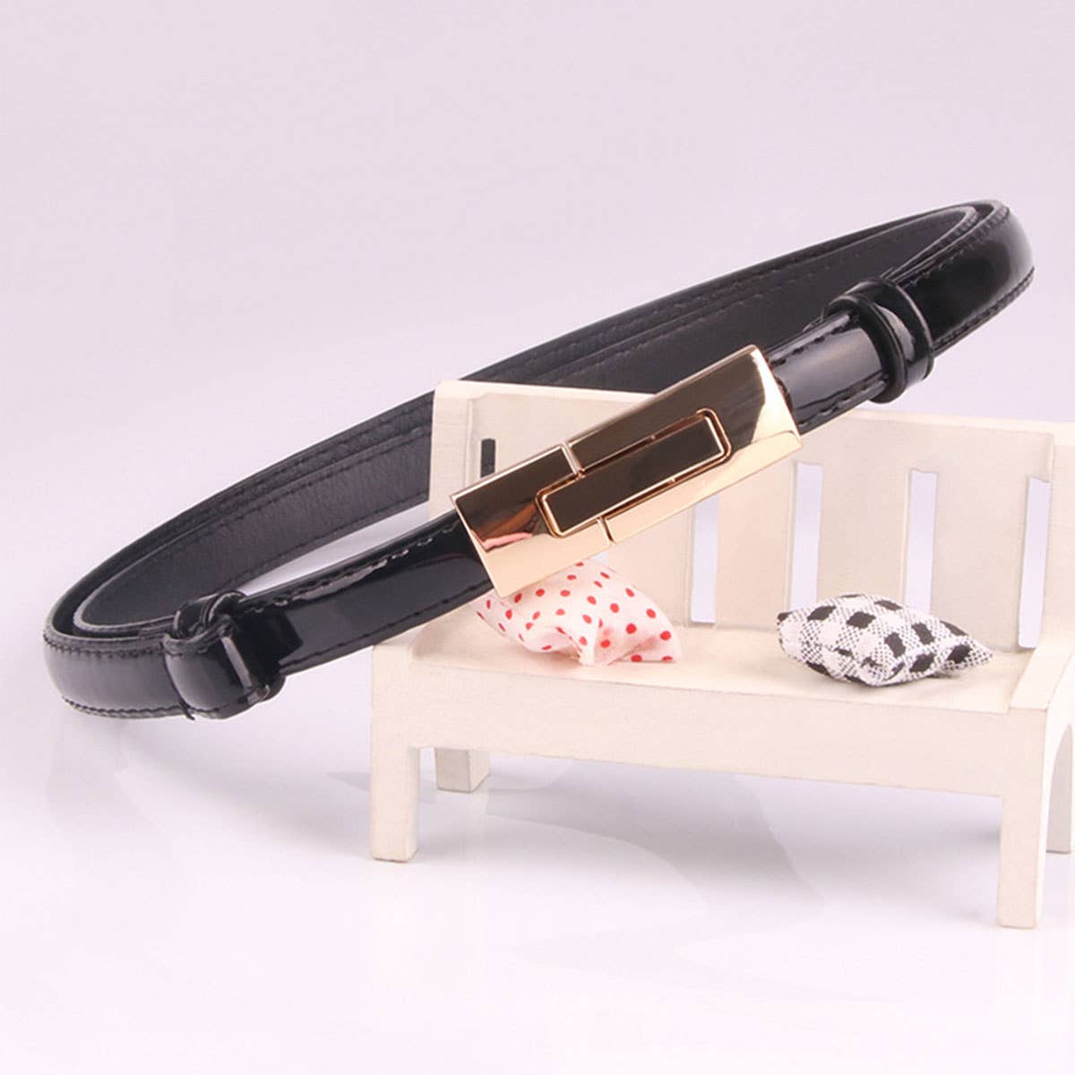 The trendy button-down adjustment thin waist belt