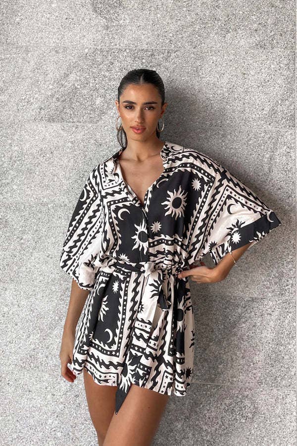 Waist-cinched lace-up V-neck geometric jumpsuit