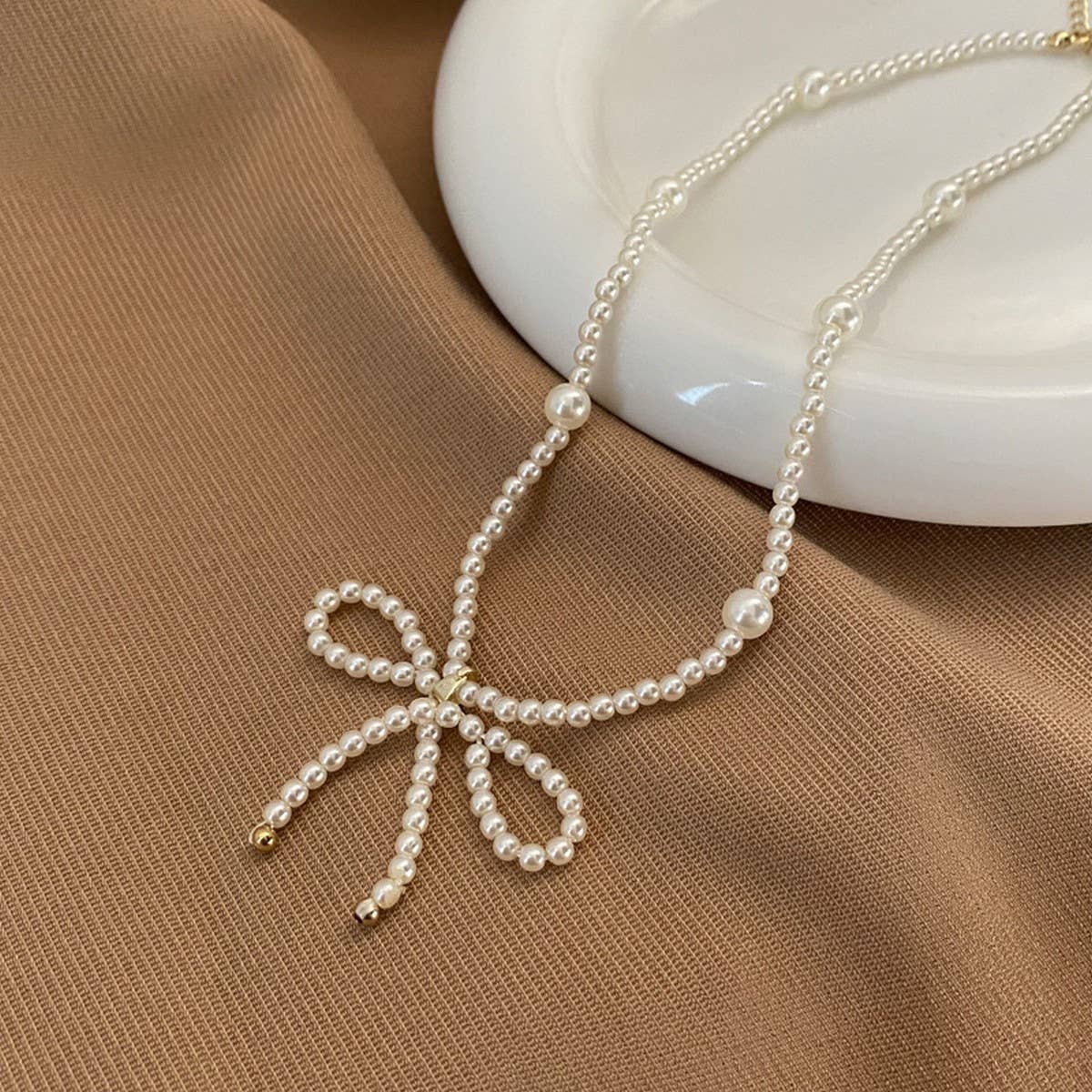 WOMEN'S PEARL BEADED VINTAGE BOW NECKLACE
