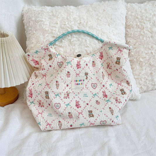 CWAB3909_CARTOON EMBOSSED CANVAS COMMUTER HANDBAG