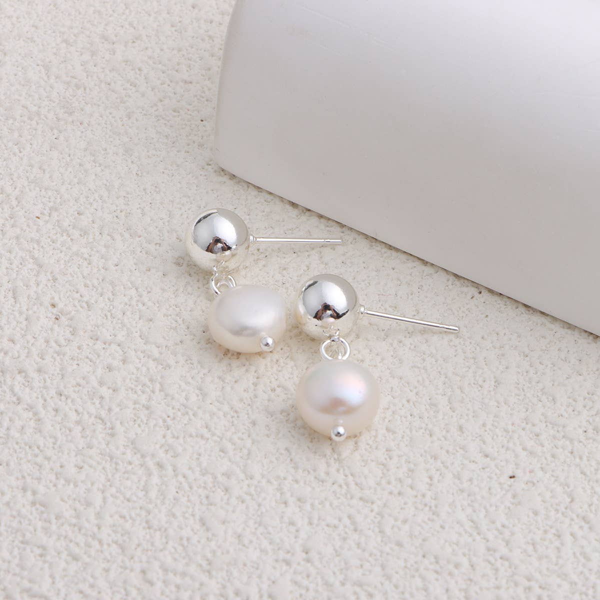 Trendy metal bow freshwater pearl earrings
