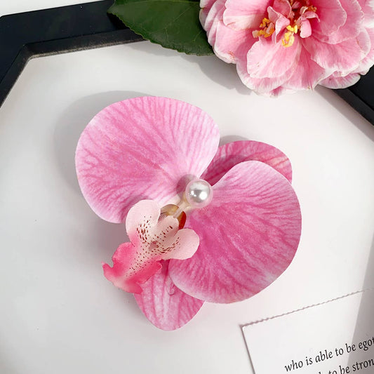 Sweet and realistic butterfly orchid hair clips