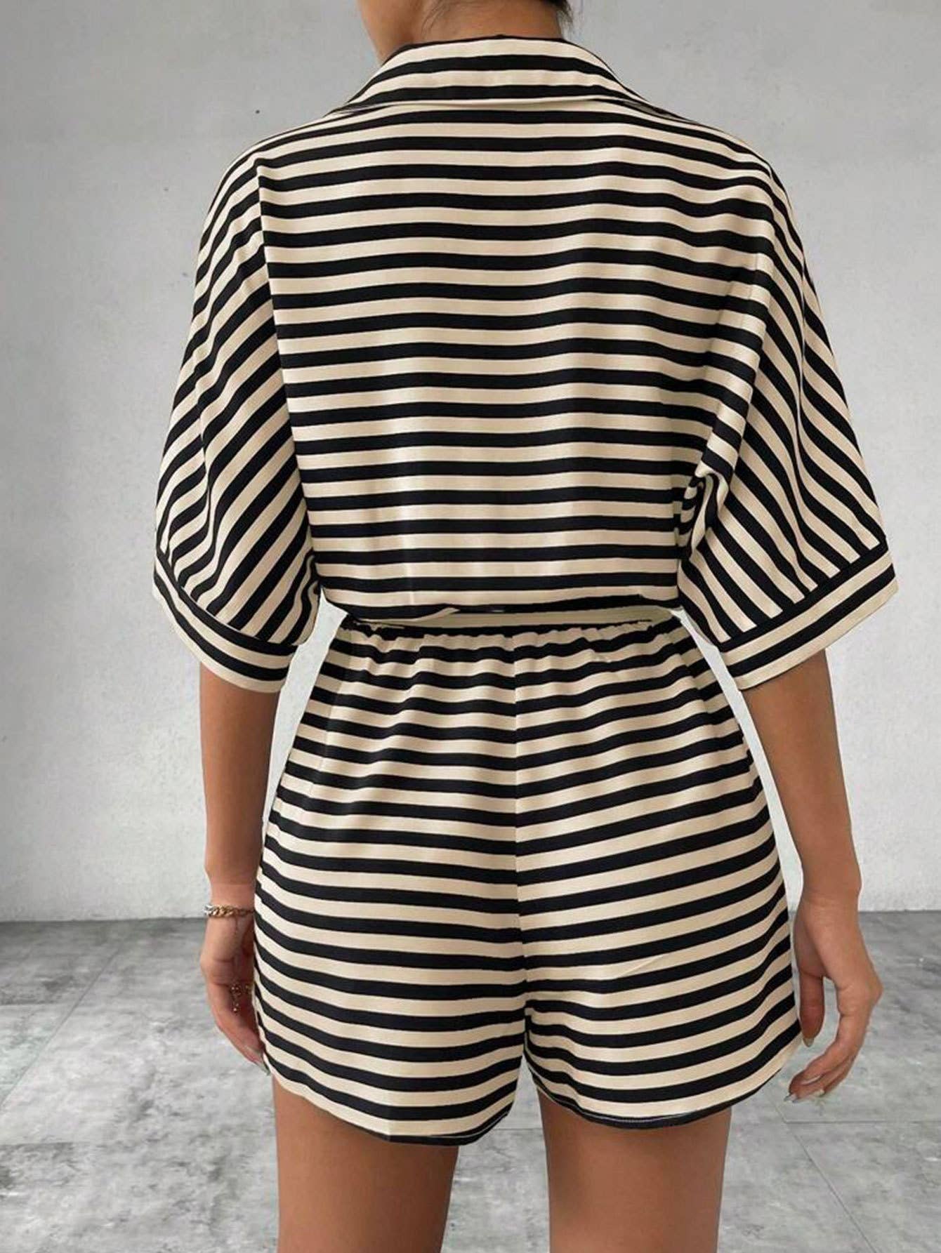 Loose casual striped cinched-waist jumpsuit