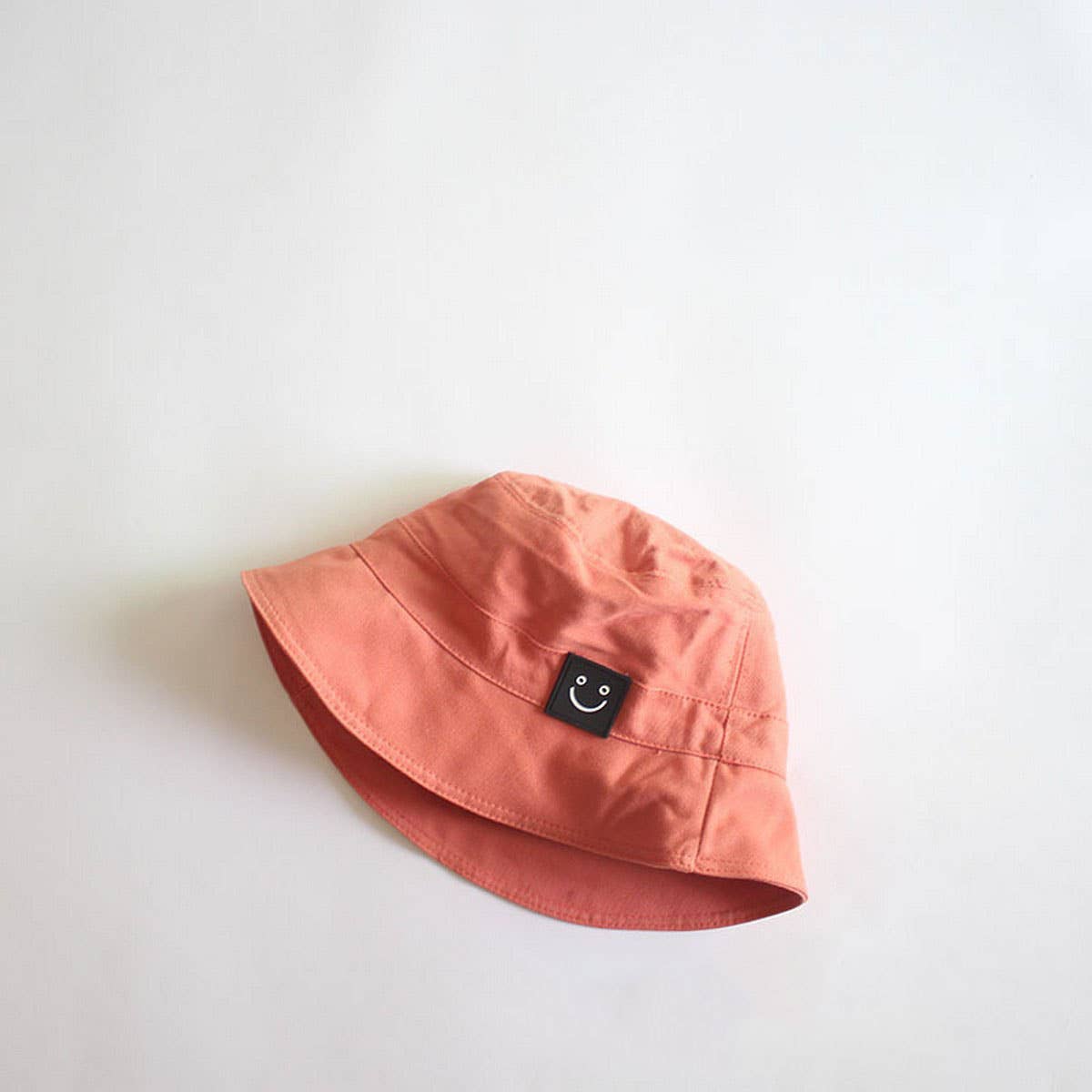 SOLID COLOR SMILEY FACE CHILDREN'S BUCKET HAT_CWAH2872