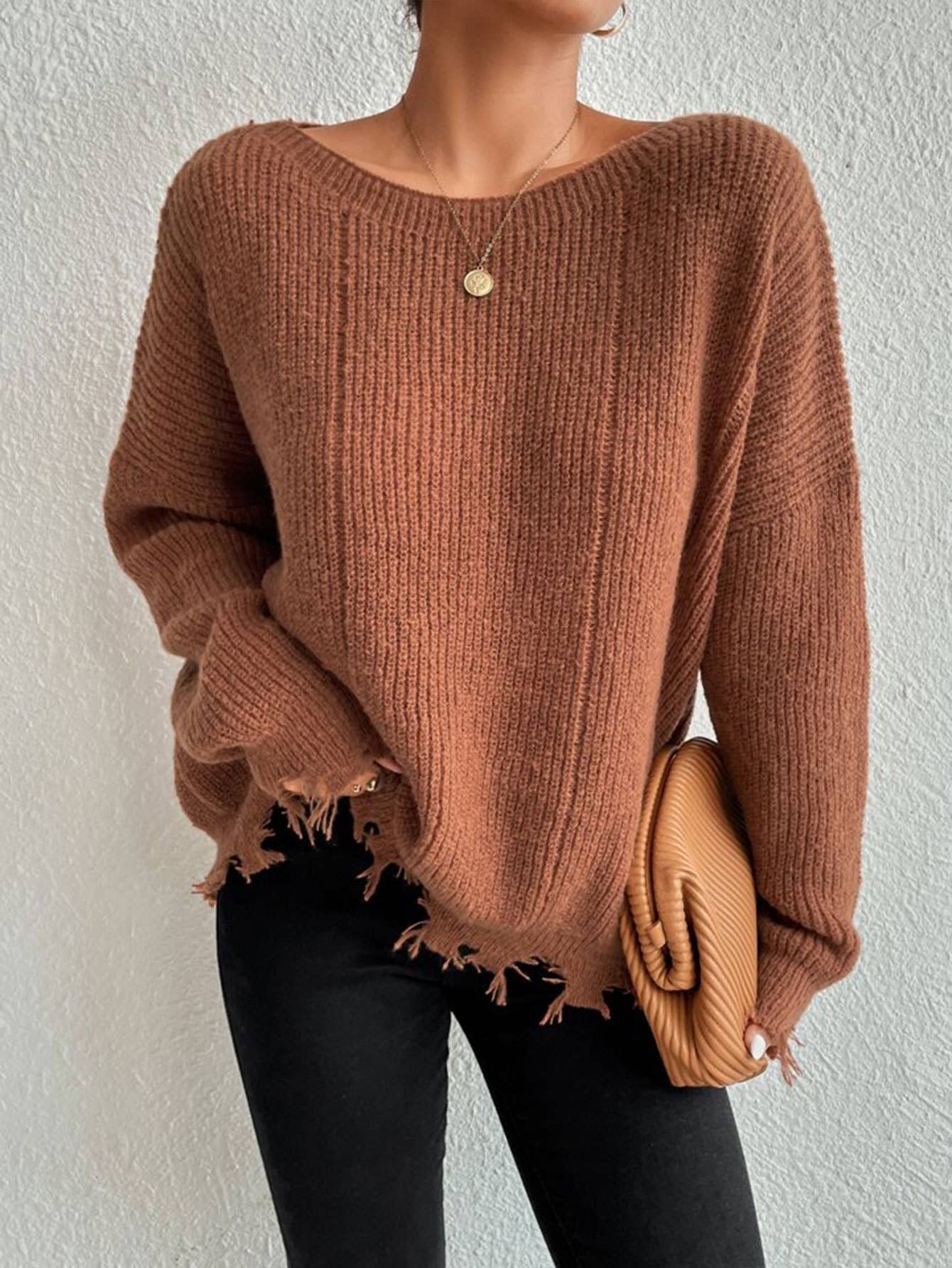Laid-back style distressed frayed sweater