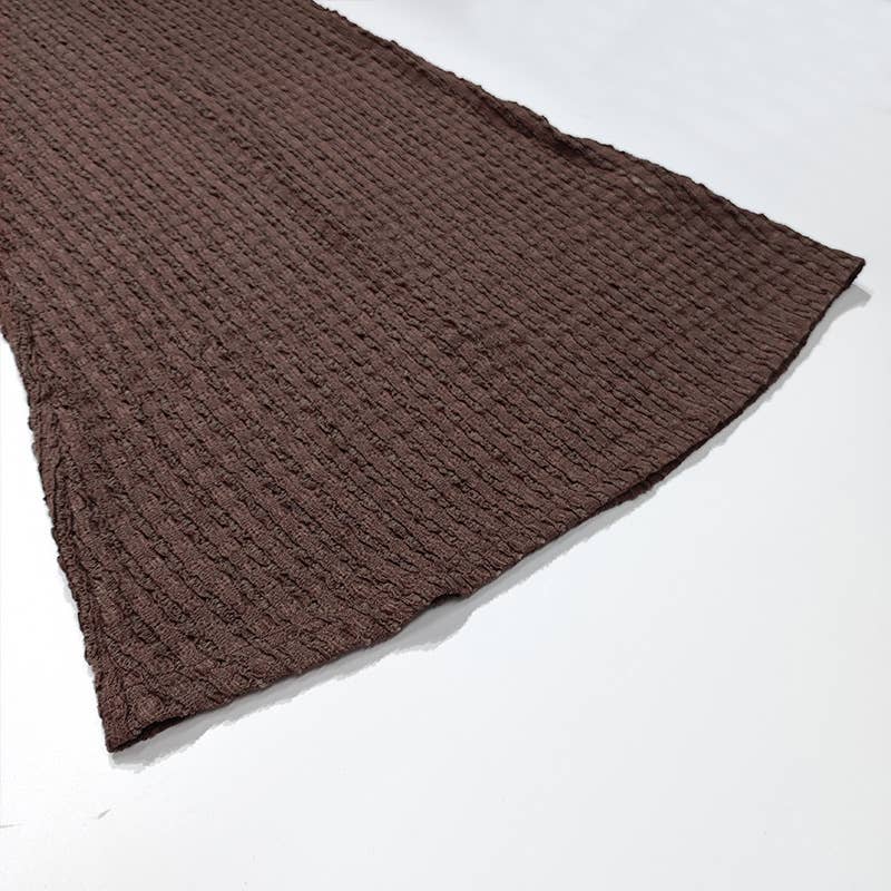 Elegant sleeveless knitted dress with a neckline